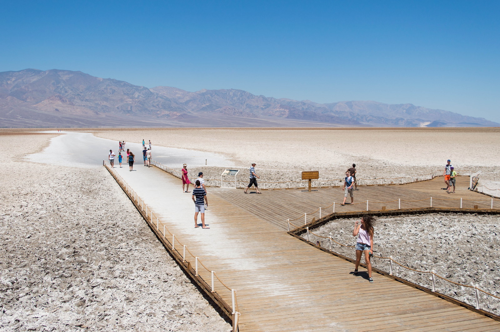 Badwater Basin salt flats and mountain walls in Death Valley National Park